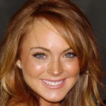 Lindsay Lohan — Bright Spring celebrity example, vivid auburn-red hair and clear blue eyes