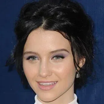 Julia Goldani Telles — Bright Winter celebrity example, near-black hair, fair cool skin and clear grey-green eyes