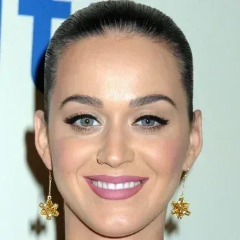 Katy Perry — Bright Winter celebrity example, near-black hair, fair cool skin and vivid blue-grey eyes