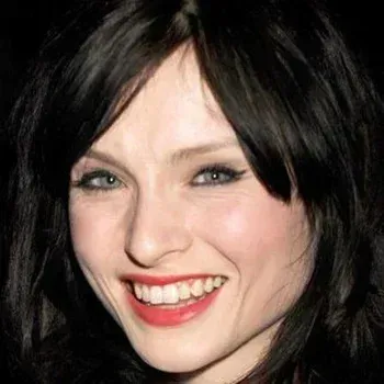 Sophie Ellis-Bextor — Bright Winter celebrity example, near-black hair, porcelain cool skin and clear grey-blue eyes