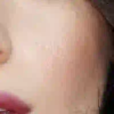 Camila Cabello's skin tone — warm peachy-golden at a light-to-medium depth
