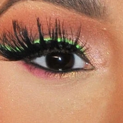 Cardi B's eyes — very dark brown with warm depth