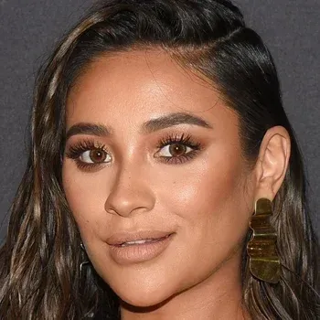 Shay Mitchell — Deep Autumn celebrity example, dark warm brown hair, warm medium-deep olive skin and dark warm brown eyes