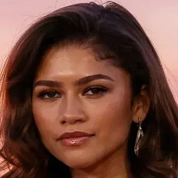 Zendaya — Deep Autumn celebrity example, warm medium-deep skin with golden undertone, dark warm brown hair and warm brown eyes