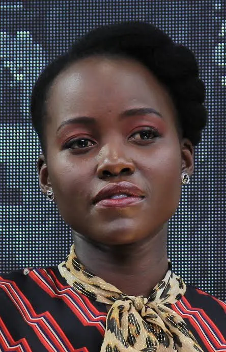 Lupita Nyong'o — warm golden-mahogany skin undertone consistent with Deep Autumn season, not Dark Winter