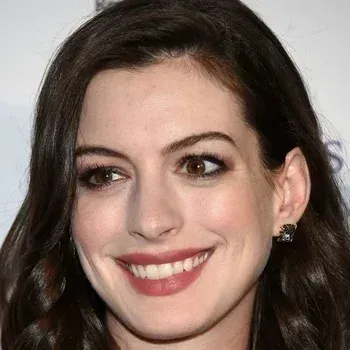 Anne Hathaway — Deep Winter celebrity example, dark cool brown hair, fair cool skin and dark brown eyes