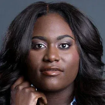 Danielle Brooks — Deep Winter celebrity example, very dark near-black hair, deep cool-neutral skin and dark eyes