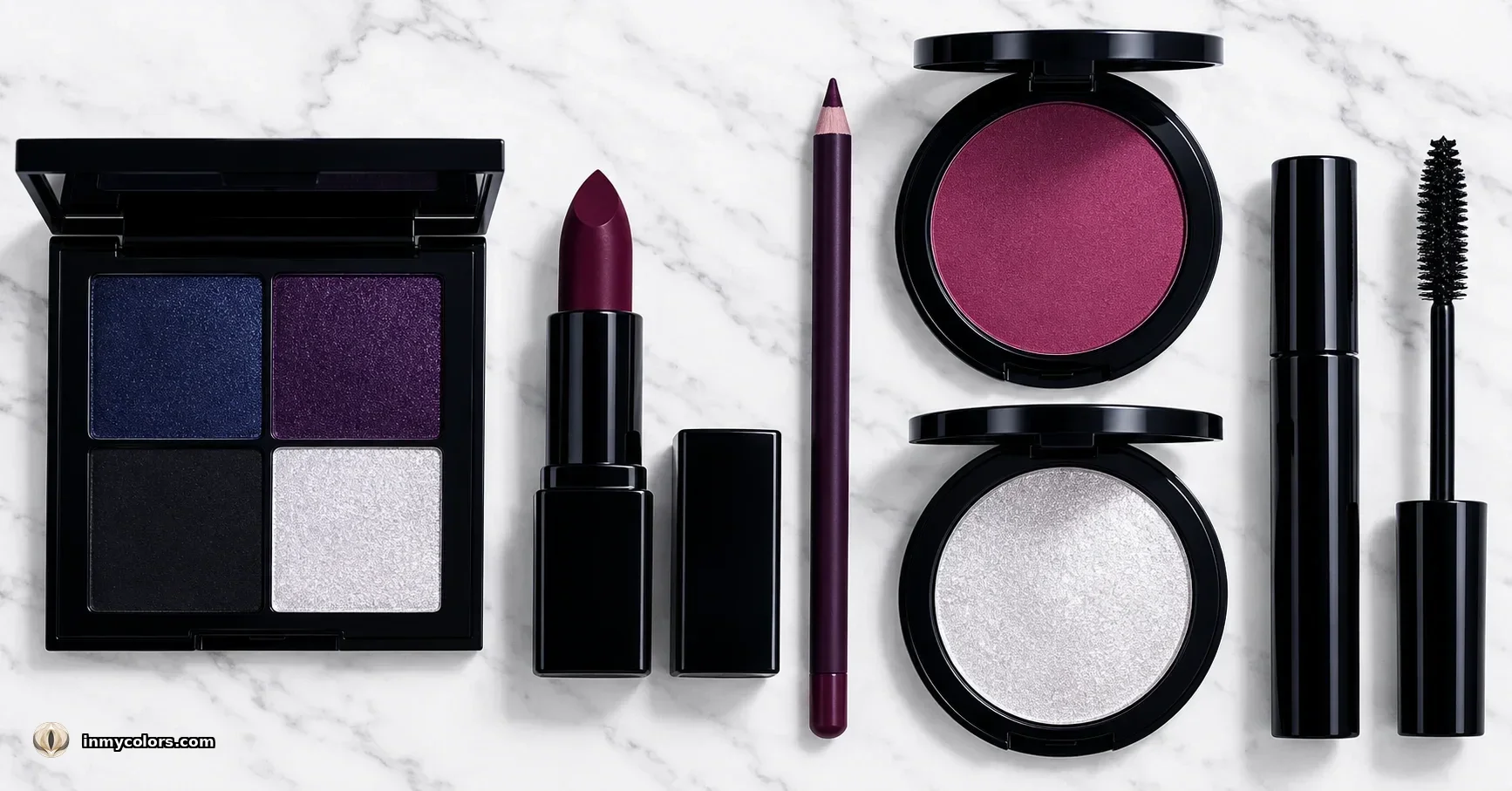 Deep Winter makeup products flatlay — deep charcoal and cool navy eyeshadow palette, deep burgundy and cool berry lipsticks, deep cool rose blush, deep coverage cool foundation, silver liner, very black mascara