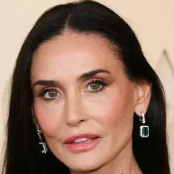 Demi Moore — Deep Winter celebrity example, near-black hair, fair cool-neutral skin and grey-green eyes