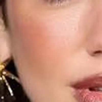 Dua Lipa's skin tone — cool neutral medium, Deep Winter quality