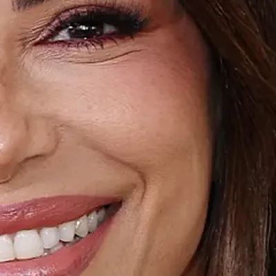 Eva Longoria's skin tone — warm medium golden, Deep Autumn quality