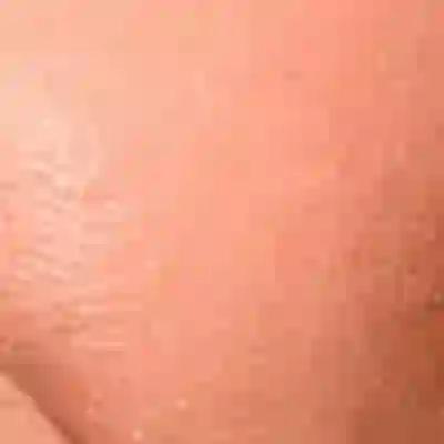 Florence Pugh's skin tone — warm peachy-golden with a light-medium depth