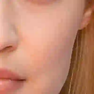Gigi Hadid's skin tone — light neutral with a soft cool-peachy quality