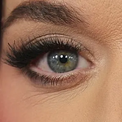 Katy Perry's eyes — vivid blue-green, electric Bright Winter quality