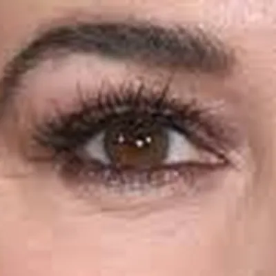 Monica Bellucci's eyes — deep dark brown dramatic, Deep Winter quality