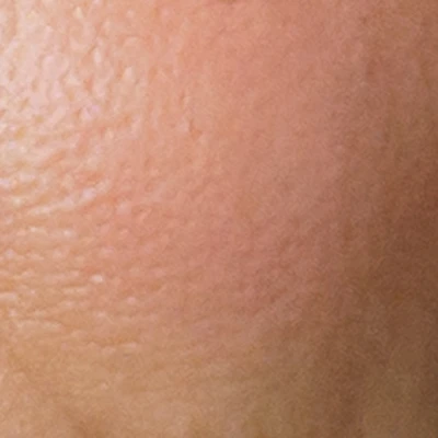 Natalie Portman's skin tone — warm peachy-light