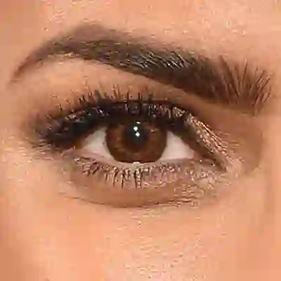 Priyanka Chopra's eyes — rich warm amber-brown with golden depth