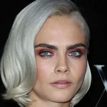 Cara Delevingne — Soft Summer celebrity example, cool blue-grey eyes and fair cool complexion with platinum-toned hair