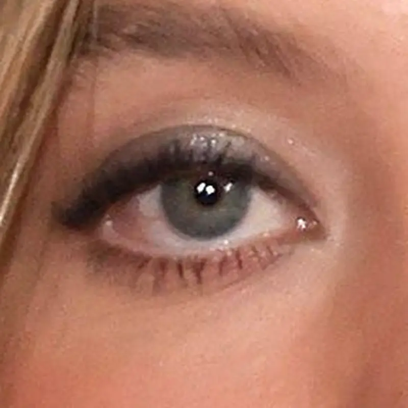 Sydney Sweeney's eyes — clear light blue-green with Spring clarity