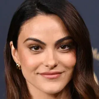 Camila Mendes — True Autumn celebrity example, warm olive skin and dark warm brown hair with warm brown eyes