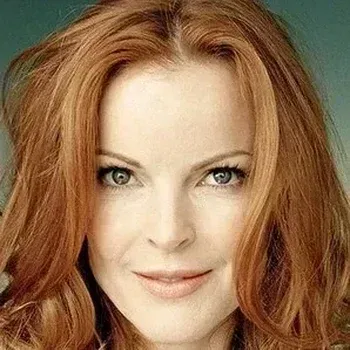 Marcia Cross portrait — vivid copper-red hair, fair peachy skin, clear green eyes, True Spring celebrity colour analysis example