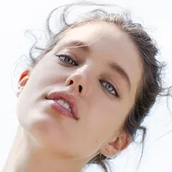 Emily DiDonato — True Summer celebrity example, cool ash-brown hair and clear blue-grey eyes