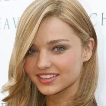 Miranda Kerr — True Summer celebrity example, cool blonde hair and blue-grey eyes with porcelain skin