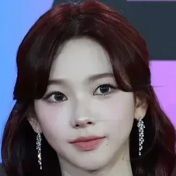 Karina (aespa) — True Winter celebrity example, very fair cool porcelain skin and dark vivid eyes with high contrast colouring