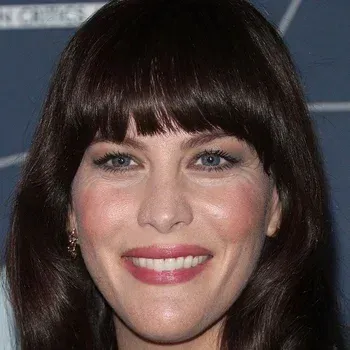 Liv Tyler — True Winter celebrity example, dark near-black hair, fair cool-pink skin and vivid blue eyes